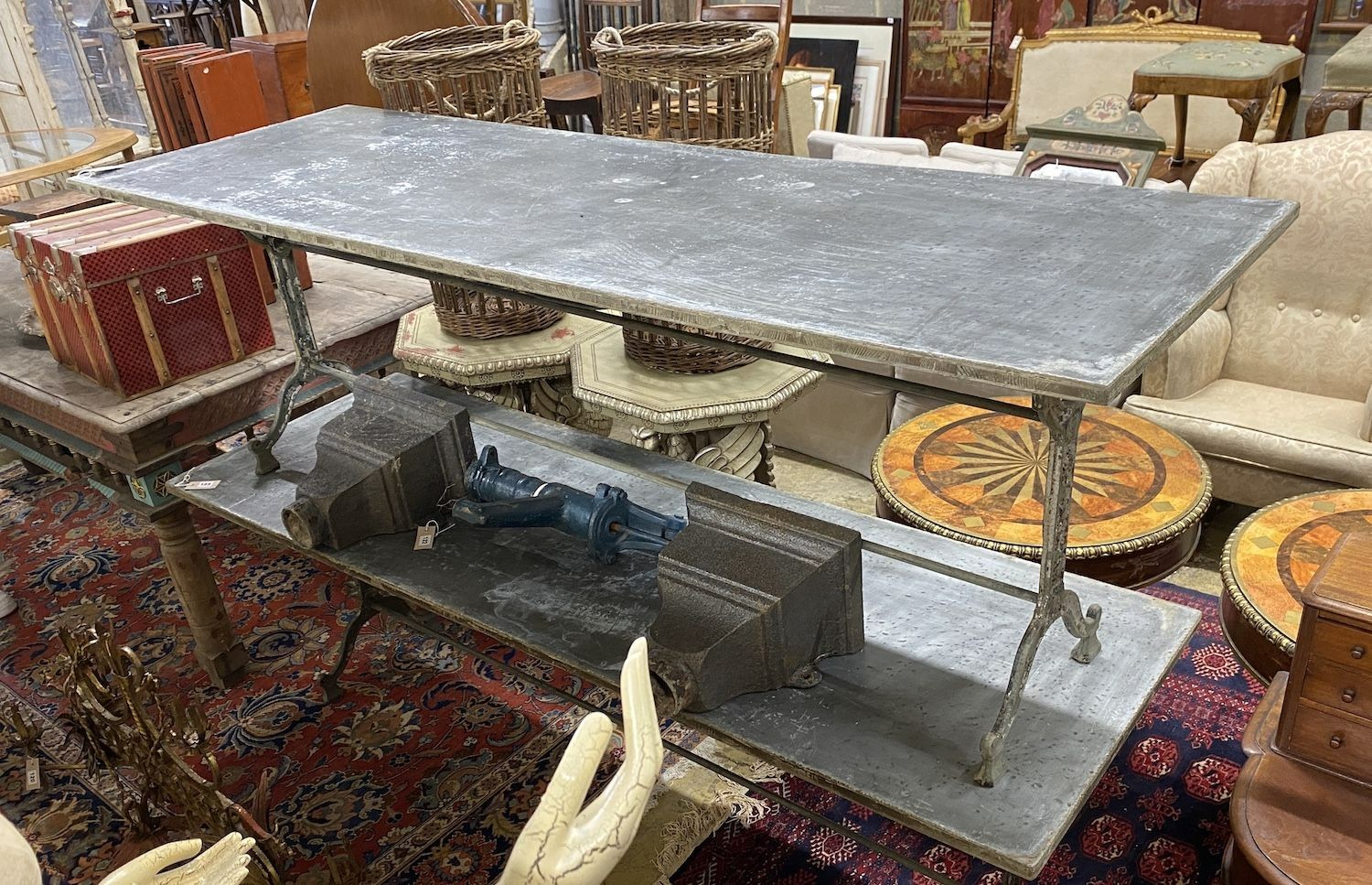 A Victorian style rectangular cast iron garden table with tin top, width 210cm, depth 69cm, height 71cm